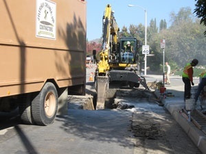 Workers excavate along Reyes Adobe Rd. in Agoura Hills