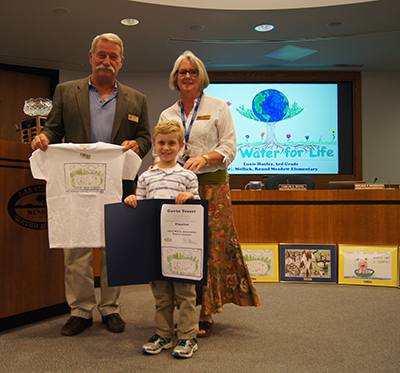 Board President Charles Caspary, Gavin Tesser, and Deborah Low