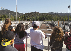 Students viewing aeration tanks at Tapia